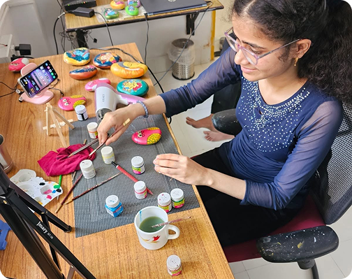 Nehal creating her artwork